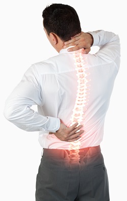 Digital composite of Highlighted spine of man with back pain | stemcellmia
