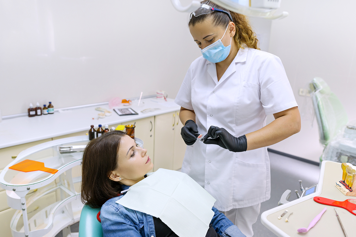 Partial denture, mature woman patient sitting