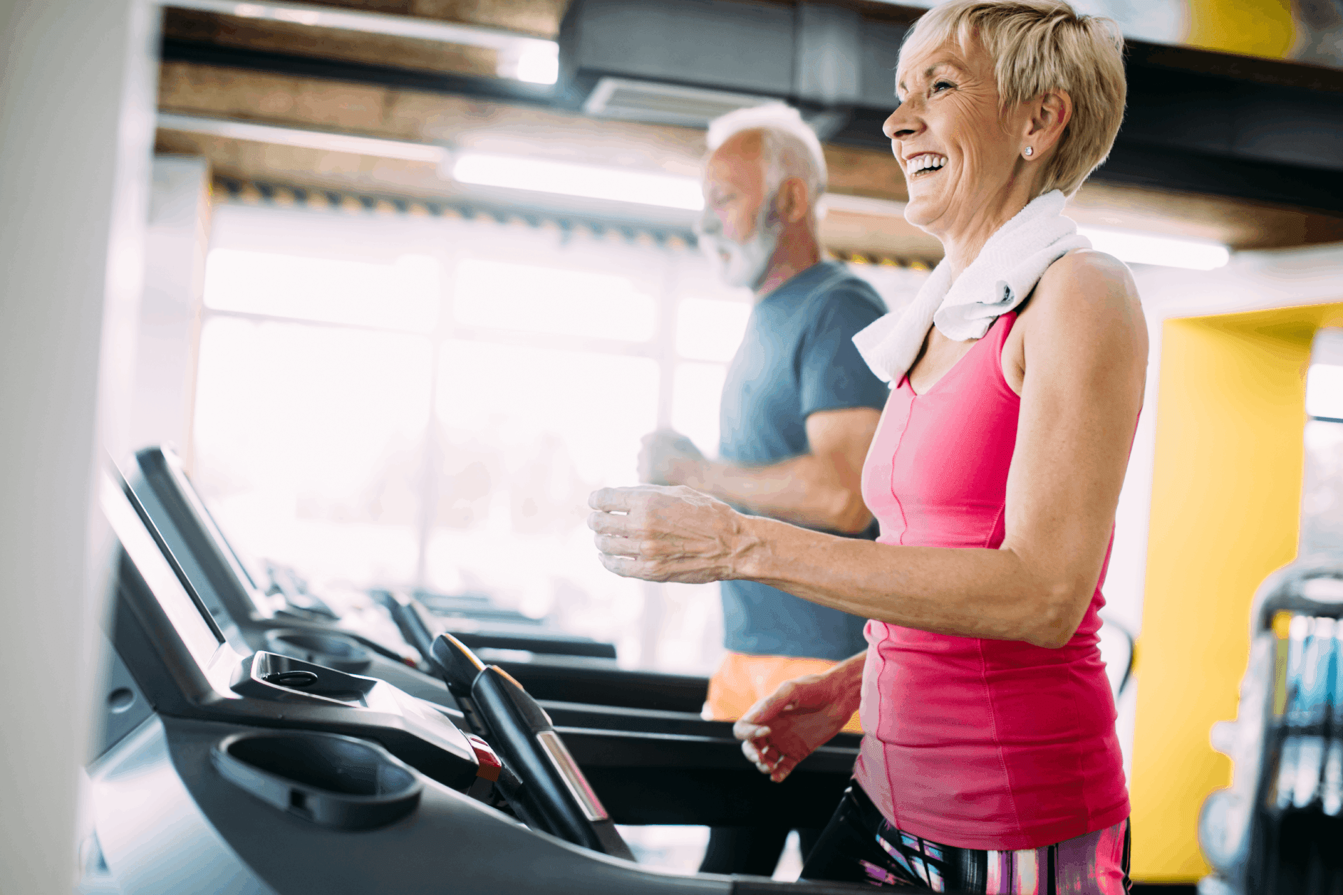 picture-of-senior-people-running-on-treadmill-in-g