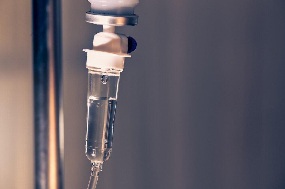 close-up-saline-iv-drip-infusion-bottle-with-iv-solution-patient-ward-hospital