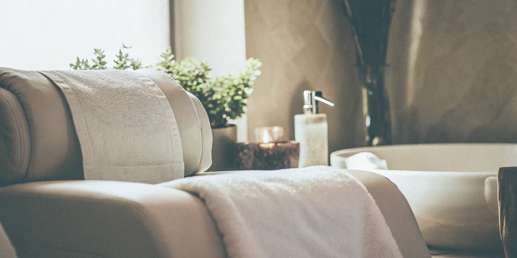 A relaxing spa room set up for an exosome facial, a key part of the treatment cost.