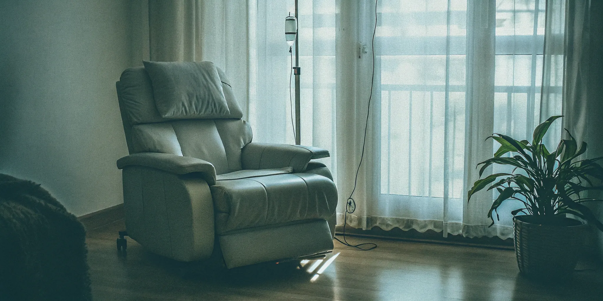 A clinical room with an IV drip setup for exosome therapy for autoimmune conditions.