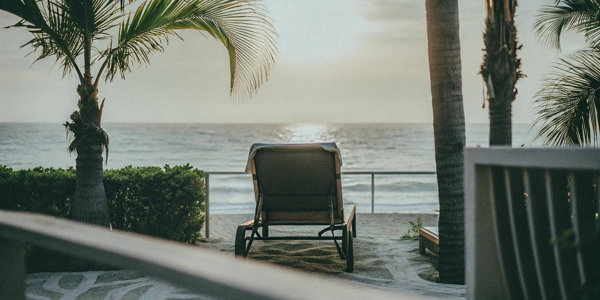 Lounge chair on a South Miami beach, enjoying renewed vitality from exosome IV therapy.