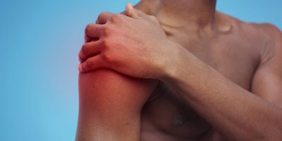 sport-trauma-concept-unrecognizable-shirtless-african-american-guy-massaging-painful-s-SBI-351504837 (1)